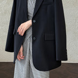 Blazer con espalda abierta y corte relajado