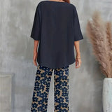 Conjunto elegante de top asimétrico y pantalón ancho con estampado floral para mujer