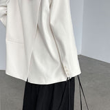 Blazer con espalda abierta y corte relajado