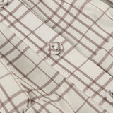 Blusa corta de cuadros, cintura ajustada, escote en pico y botones en la parte delantera.