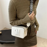 Bolso bandolera de moda con estampado de leopardo y letras