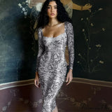 Vestido midi elegante, chic, sofisticado, moderno y seductor, moderno y exótico.