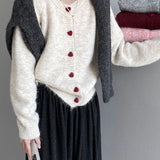 Cárdigan oversize con botones en forma de corazón y cuello redondo