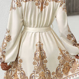 Minivestido étnico elegante con estampado paisley y escote en pico