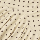Conjunto maxi de dos piezas con lunares fruncidos