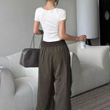 Pantalones cargo retro Y2K con botones y dobladillos