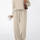 Conjunto casual chic de dos piezas con bolsillos y cordón, color liso.