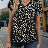 Blusa chic con lunares negros y dorados: elegante, divertida y versátil para mujer.