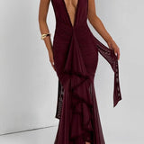 Vestido de noche sexy de sirena con escote pronunciado y espalda abierta.