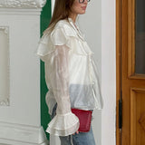 Blusa de gasa de tencel con mangas acampanadas y volantes
