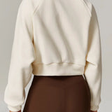 Chaqueta deportiva de yoga de polar con cuello alto y cremallera.