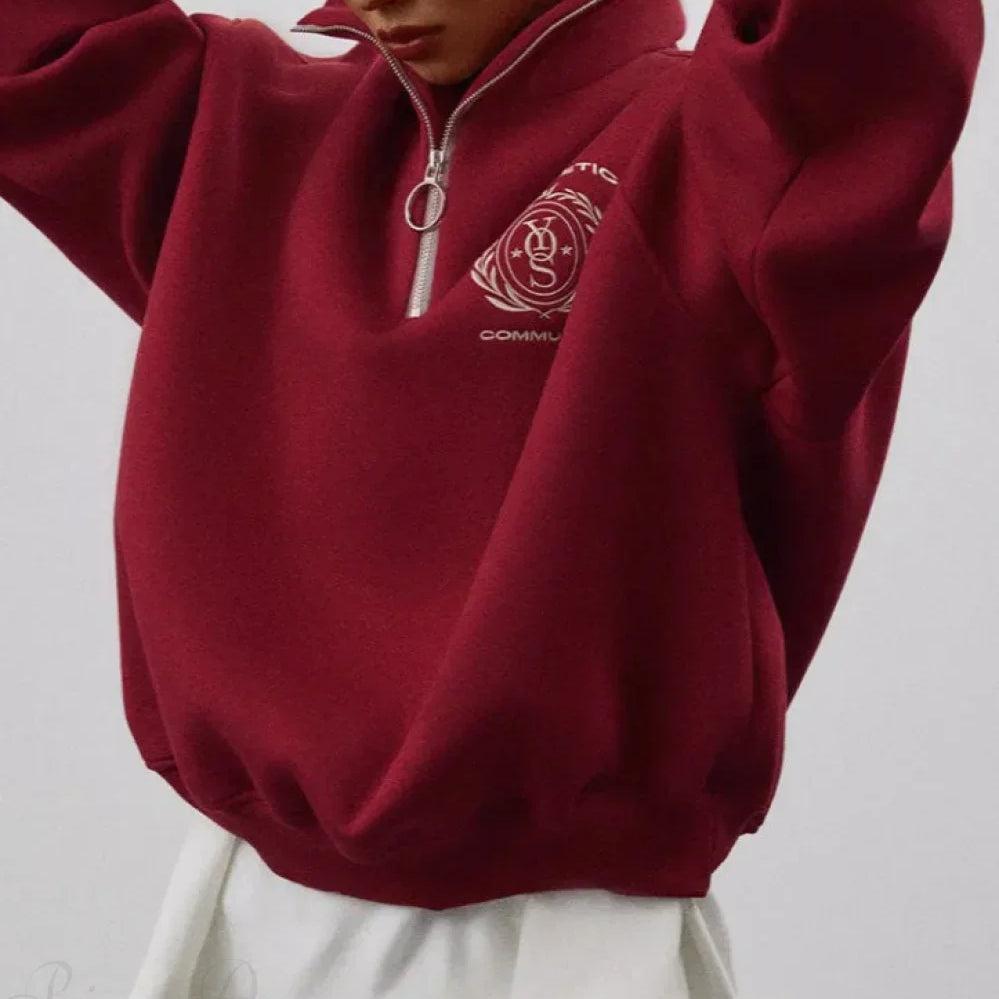 Sudadera de cuello alto, media cremallera y forro polar con letras bordadas