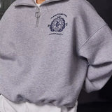 Sudadera de cuello alto, media cremallera y forro polar con letras bordadas