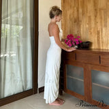 Vestido midi de cumpleaños de verano con fruncido, espalda abierta, abertura y adornado con apliques florales.