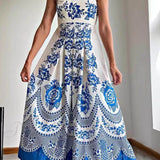 Elegante vestido midi holgado con fruncido en la espalda y estampado de flores étnicas.