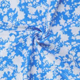 Elegante minivestido ajustado con tirantes finos y estampado floral.