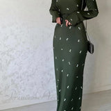 Vestido midi con estampado floral de cintura alta y cinturón