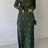 Vestido midi con estampado floral de cintura alta y cinturón