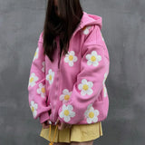 Sudadera con capucha extragrande con cremallera y aplique floral