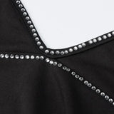 Vestido de tirantes mullido con volantes y adornado con pedrería