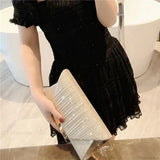 Clutch de noche con lentejuelas