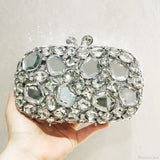 Clutch de noche con cristales dorados y plateados