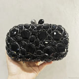 Clutch de noche con cristales dorados y plateados