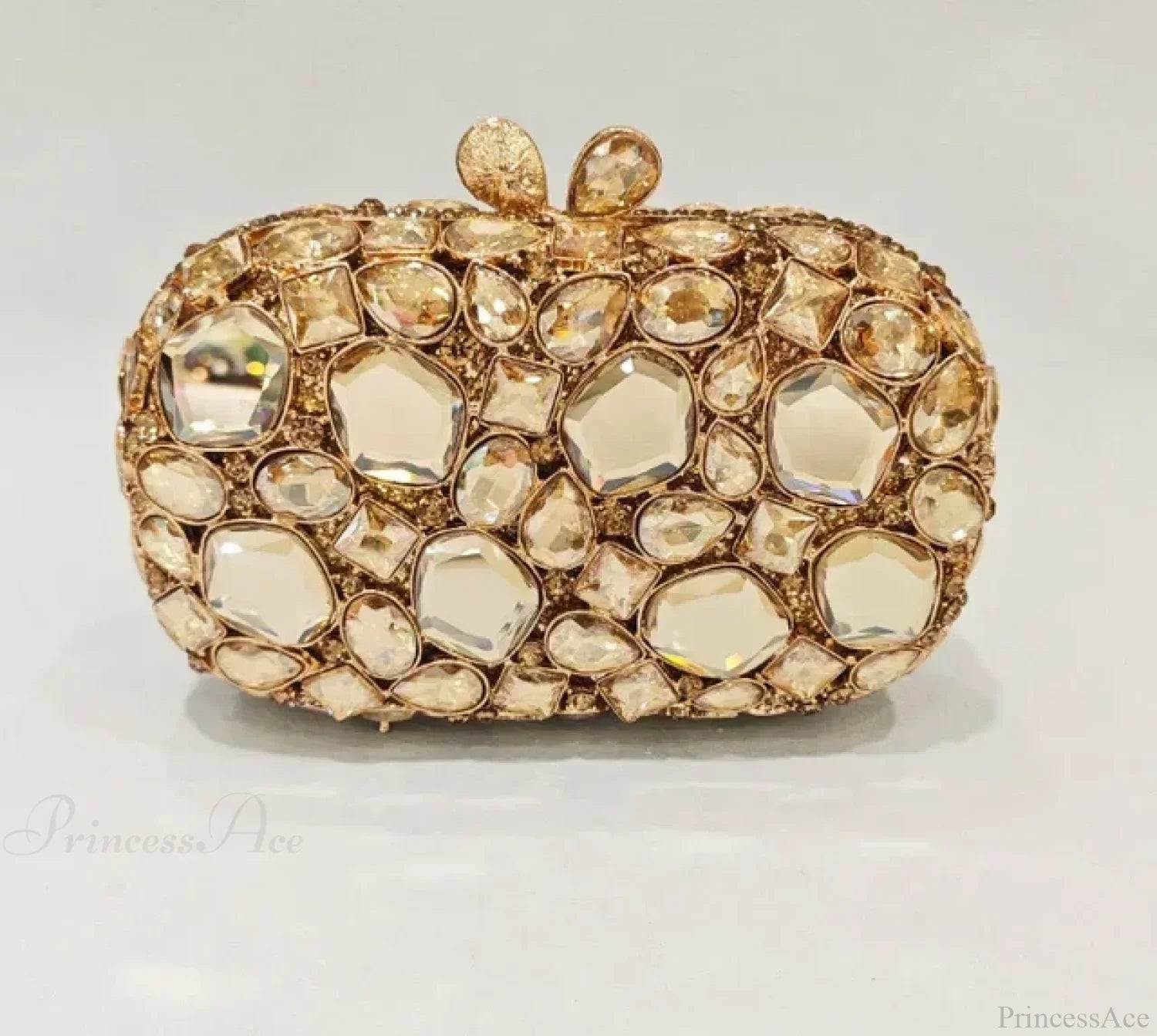 Clutch de noche con cristales dorados y plateados