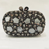 Clutch de noche con cristales dorados y plateados