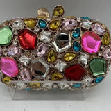 Clutch de noche con cristales dorados y plateados