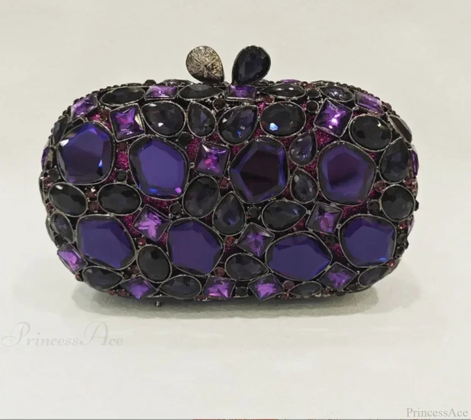 Clutch de noche con cristales dorados y plateados