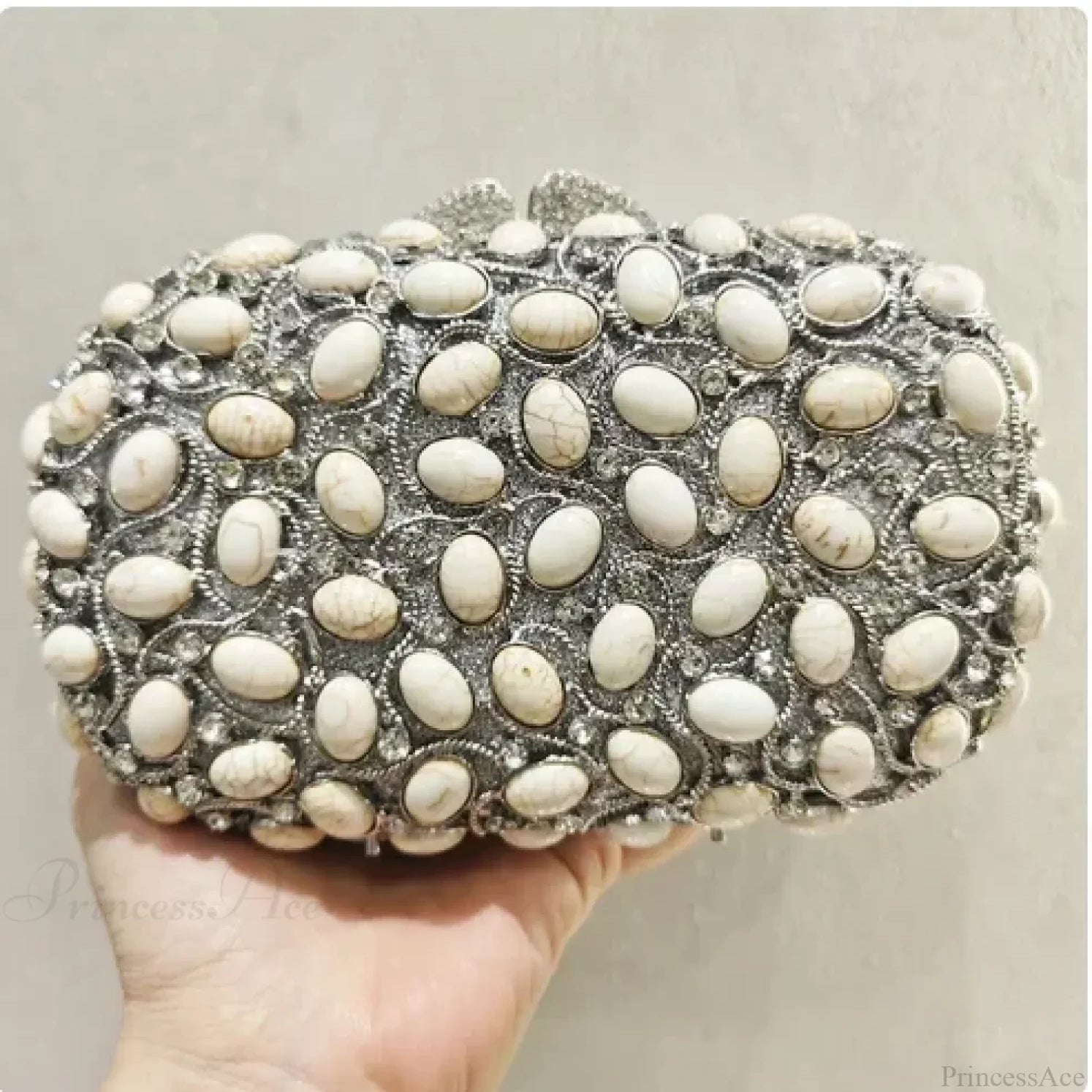 Clutch de noche con cristales dorados y plateados