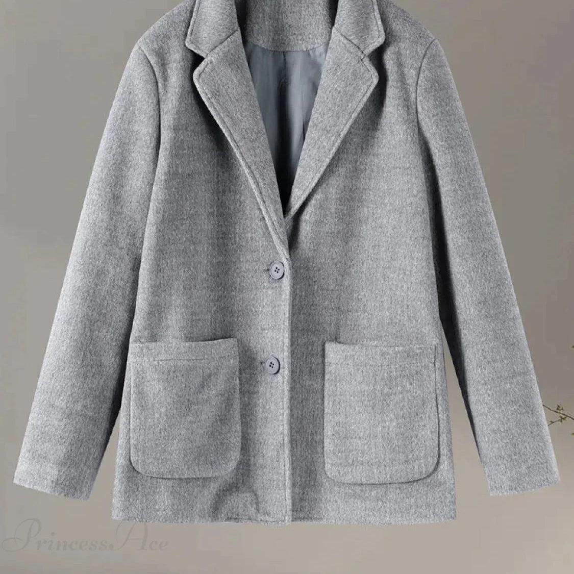 Abrigo informal de lana gris con botones con muescas