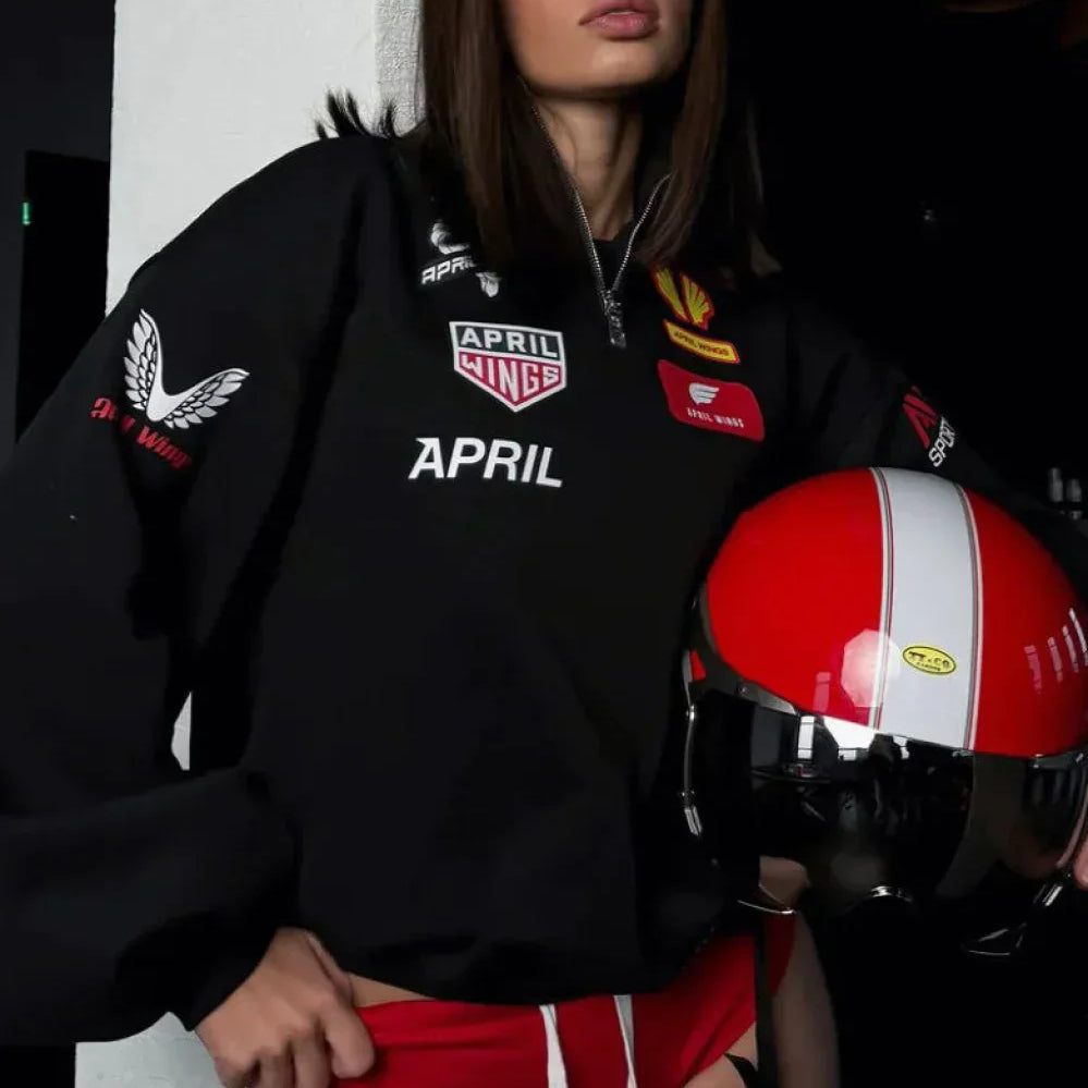 Sudadera holgada con cuello alto y estampado de motociclista, media cremallera.