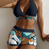 Conjunto de bikini de dos piezas con short estampado y diseño sin espalda.