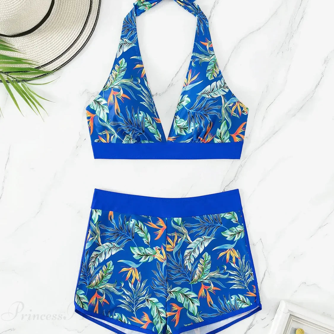 Conjunto de bikini de dos piezas con short estampado y diseño sin espalda.