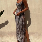 Elegante vestido midi sin espalda con estampado halter