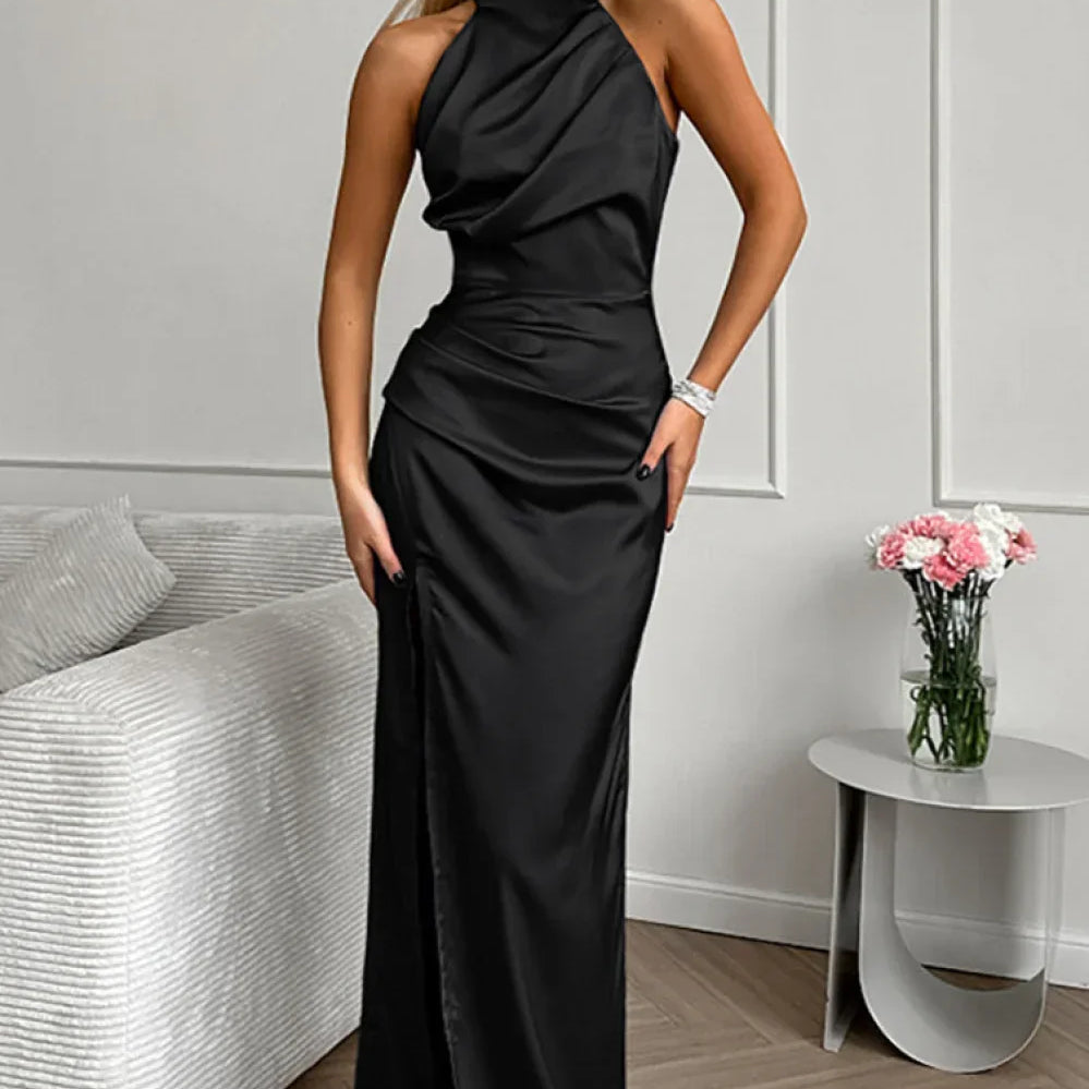 Vestido largo elegante con abertura, color liso, espalda abierta y sin mangas.