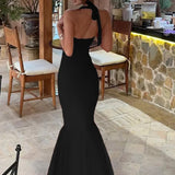 Vestido largo sin espalda con falda sirena