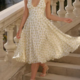 Vestido midi sin espalda con cuello halter y escote en V pronunciado, encantador vestido floral.