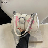Bolso de hombro de lona con hebilla de metal