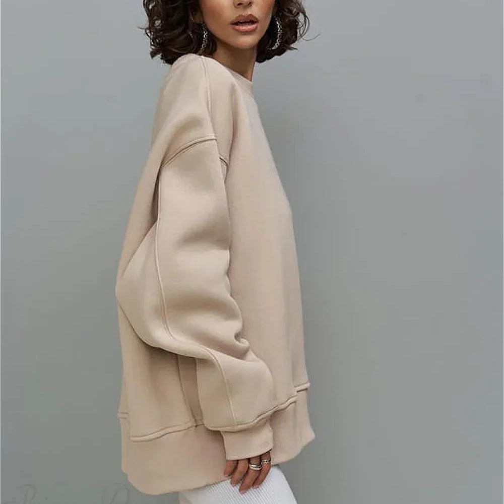 Sudadera oversize con cuello redondo y estampado con etiquetas gruesas de canalé.