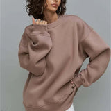 Sudadera oversize con cuello redondo y estampado con etiquetas gruesas de canalé.