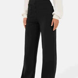 Pantalones elegantes de cintura alta: comodidad elástica y estilo moderno.