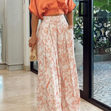 Conjunto de dos piezas para mujer: Top holgado con mangas murciélago y pantalones anchos de cintura alta.