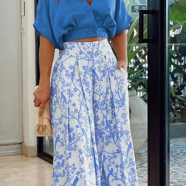Conjunto de dos piezas para mujer: Top holgado con mangas murciélago y pantalones anchos de cintura alta.
