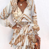 Vestido de mujer – corte evasé – mangas largas – escote en pico – estampado – cintura fruncida