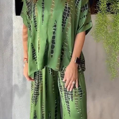 Conjunto de traje para mujer: satén suave, corte holgado, cuello redondo, pantalón ancho estampado.