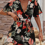 Mono corto de mujer – Escote cruzado – Mangas con volantes – Cinturón para anudar – Estampado floral