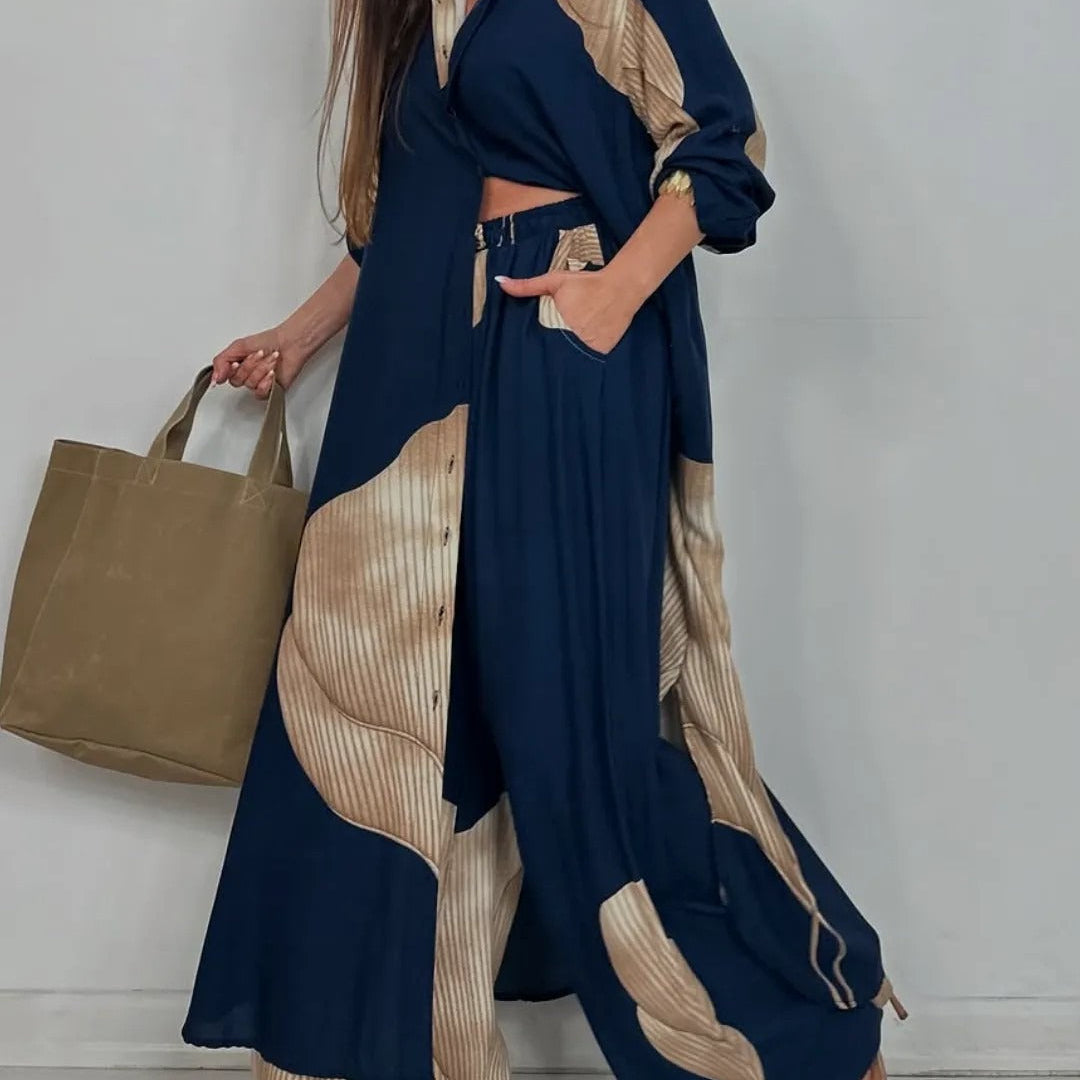 Conjunto de dos piezas para mujer: túnica larga abotonada y pantalón ancho y fluido.